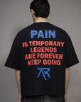 T-shirt "PAIN" con borchie