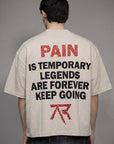 T-shirt "PAIN" con borchie