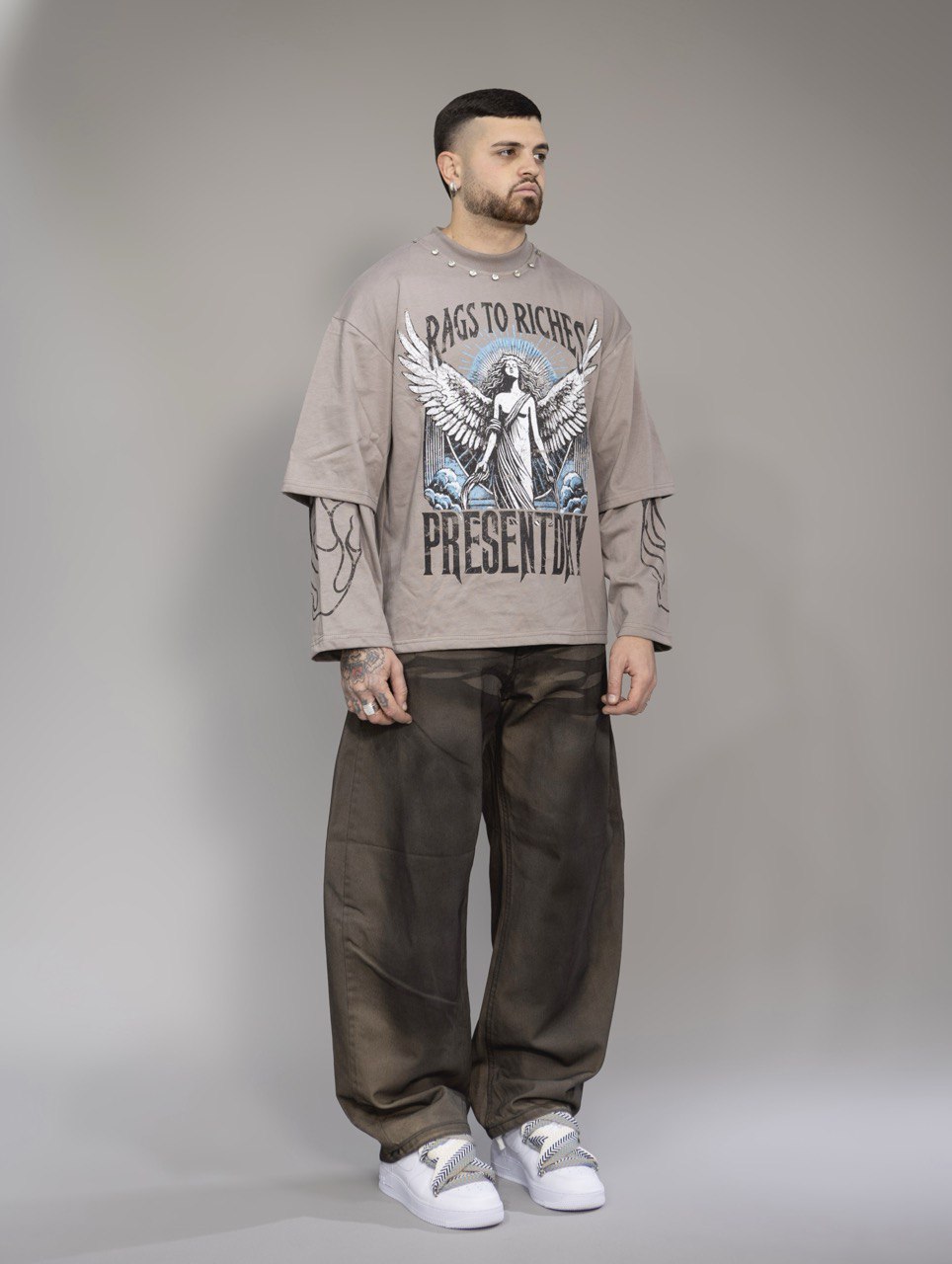 Double sleeve "RAGS TO RICHES" present day