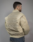 Varsity jacket "TRUST" con ricamo